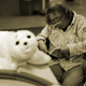 A resident reads a book during a session Paro at Shin-tomi nursing home in Tokyo, Japan.